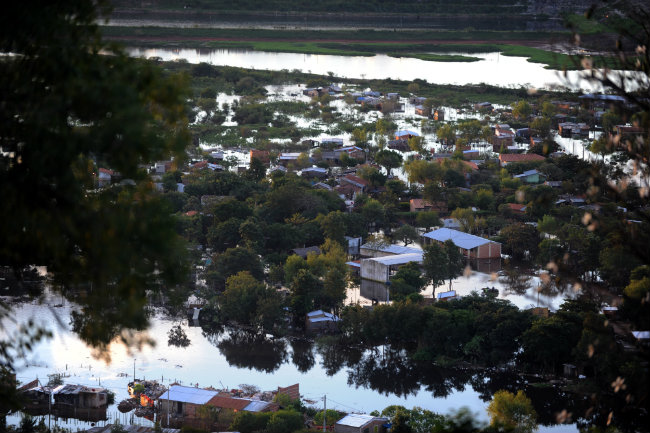 Flooding in Paraguay Sends Thousands Fleeing to Shelters