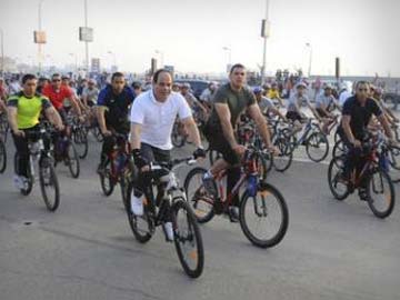 Dressed for Cycling, Egypt's Sisi Calls for Help on Fuel Subsidies