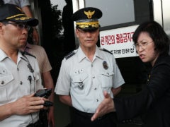 South Korea Police Storm Compound in Search For Ferry Owner