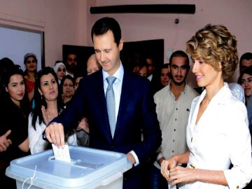 Amid War and Shelling, Syrians Vote For President