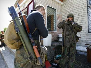 Fighting Strains Ukraine Ceasefire, Putin Urges Dialogue