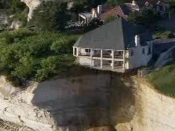 Homeowner to Torch House Teetering on Lake Cliff in Texas