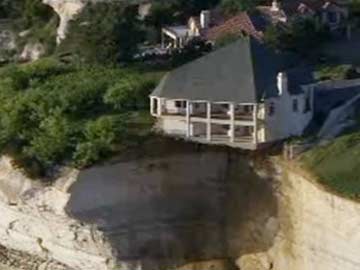 Homeowner to Torch House Teetering on Lake Cliff in Texas