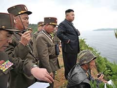 North Korea's Kim Jong-un Issues Warning at Live Rocket Firing Drill