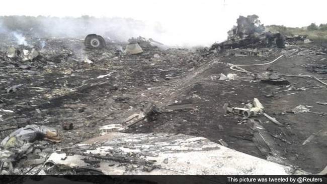 Burning Wreckage, Dozens of Bodies at Scene of Plane Crash in Ukraine