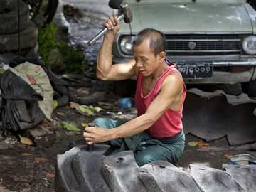 In Myanmar Shops, Old Tyres Find Many New Lives 