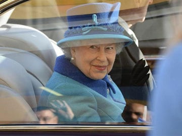 Queen Smashes Whisky, Gives Her Name to Britain's Biggest Warship