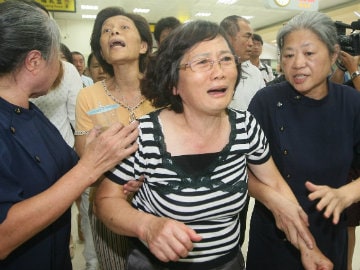 Relatives Fly to Taiwan's TransAsia Airways Plane Crash Site