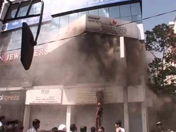 On Bangalore's MG Road, Gold Flung Out in Plastic Bags After Fire in Jewellery Showroom