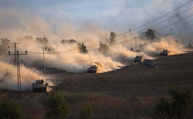 Israeli Tanks Dig in at Gaza Frontier as Palestinian Toll Tops 300