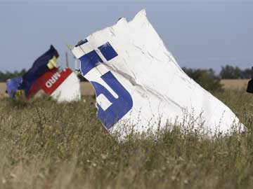 Moscow Fights Back After Sanctions; Battle Rages Near Ukraine Crash Site