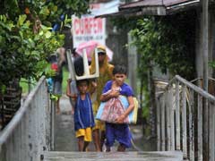 At Least One Dead as Typhoon Rammasun Smashes Philippines