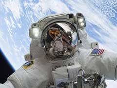 Spacewalking Astronauts Release Peruvian Satellite