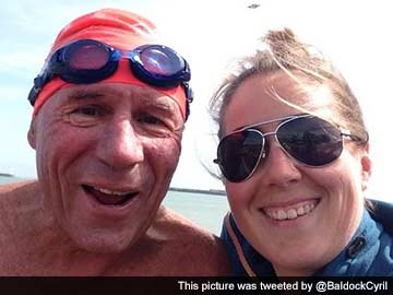 Australian, 70, Celebrates English Channel Swimming Record