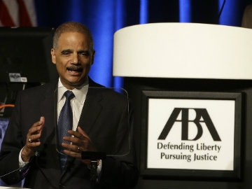US Attorney General Eric Holder Brings His Civil Rights Push to Ferguson