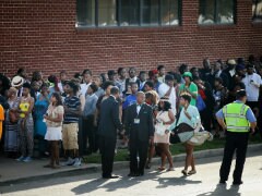 Thousands of Mourners Gather for Slain Ferguson Teen's Funeral