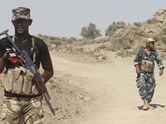 Iraqi Forces Battle to Drive Jihadists From Saddam's Home Town
