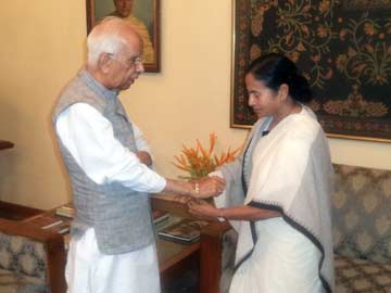 Mamata Banerjee Ties Rakhi to Governor Kesari Nath Tripathi