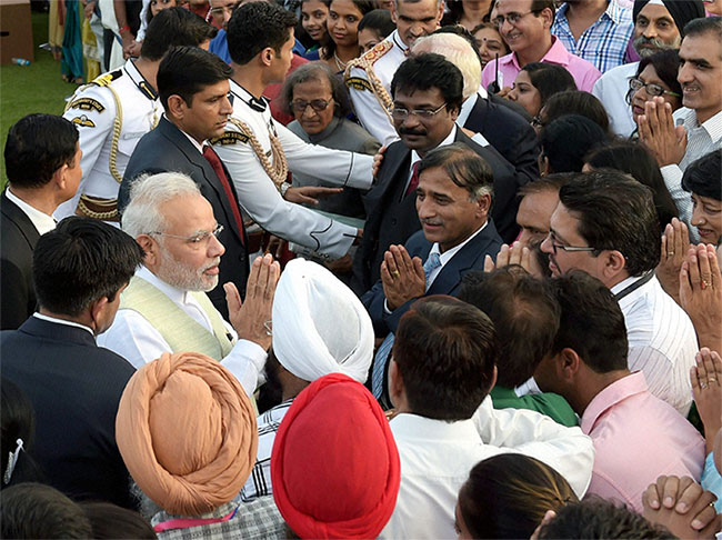 At Rashtrapati Bhavan, PM Narendra Modi Signs Autographs for Public     