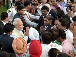 At Rashtrapati Bhavan, PM Narendra Modi Signs Autographs for Public At Rashtrapati Bhavan, PM Narendra Modi Signs Autographs for Public