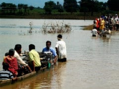 Boatmen Rescue Marooned People in Odisha
