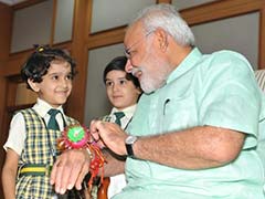 Women, Children Tie Rakhi on Prime Minister Modi's Wrist