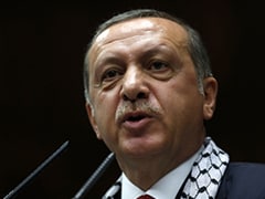 Turkey PM Tayyip Erdogan Lashes Out at Israel at Election Rally