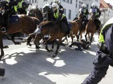 Police Horses Trample Rival Protesters at Far Right Rally in Sweden