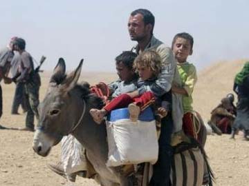 Iraq's Yazidis Who Escaped Mount Sinjar Haunted by Horrors