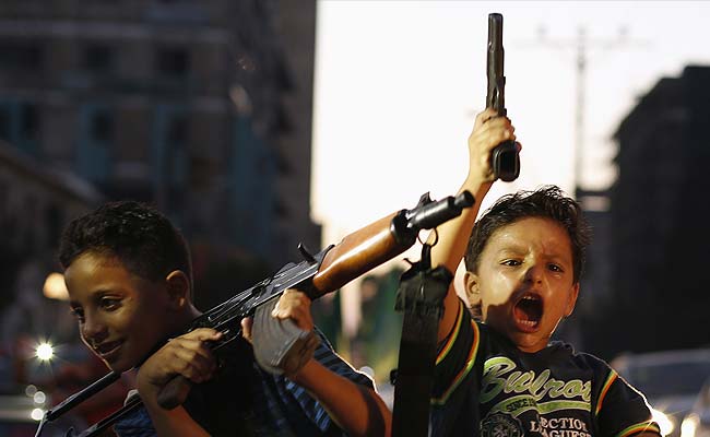 Chilling Pictures of Gaza Children Holding Guns