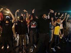 Police Deploy Tear Gas to Impose Ferguson Curfew