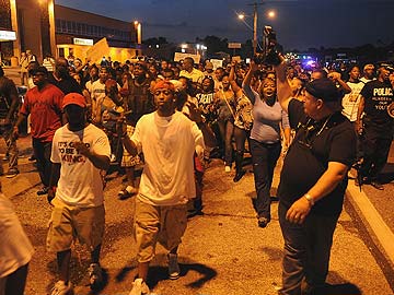 Peaceful Evening March in Violence-Shaken Ferguson