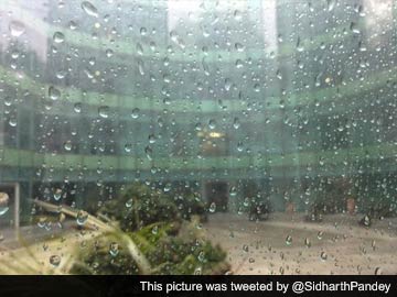 Delhi: Rain Brings Respite From Sweltering Weather Conditions 