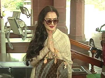 Rekha, Finally at Parliament, Allows Photo-ops On Way In