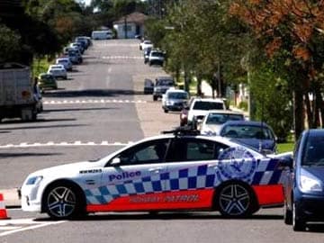 Australian PM Says Police Raids Follow Threat of Beheading