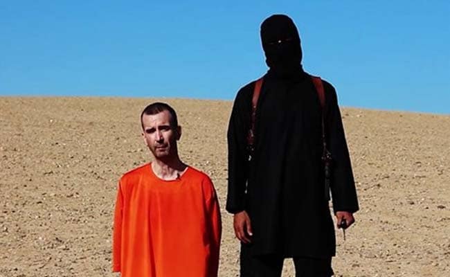 Berlin Condemns British Aid Worker David Haines Beheading As 'Barbaric Violence'