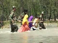 Kashmir Floods: Crossing the Overflowing Suran River, Holding a Rope and a Soldier's Hand