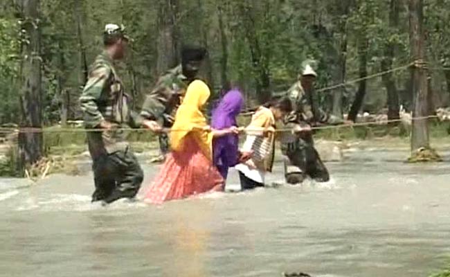 Kashmir Floods: Crossing the Overflowing Suran River, Holding a Rope and a Soldier's Hand