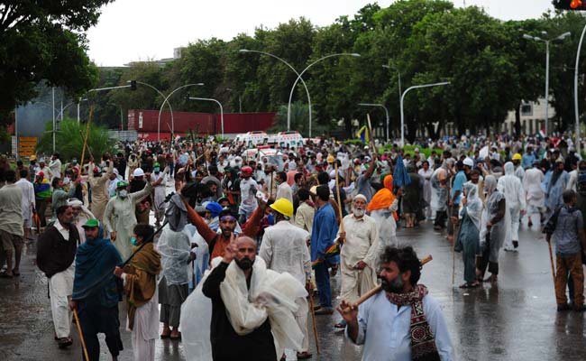 Pakistani Protesters Clash With Police, Army Secures State TV