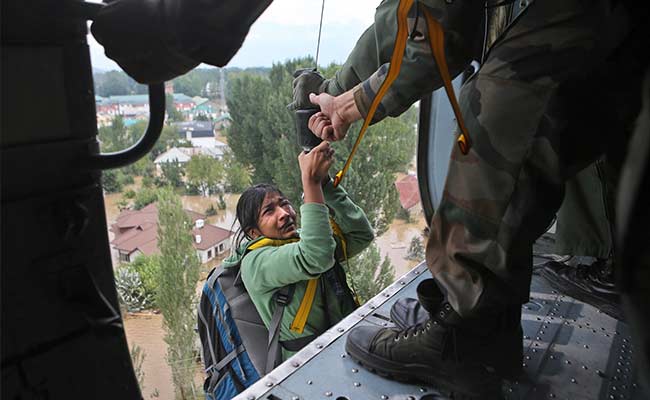Russian Women Show the Way, Ask Army Men to First Rescue Needy