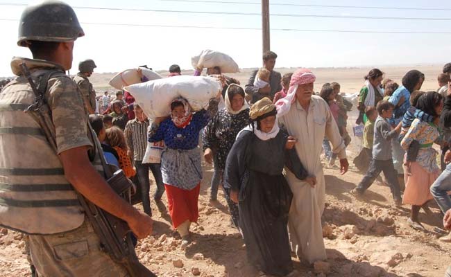 Thousands of Syrian Kurds Enter Turkey, Fleeing Islamic State Advance