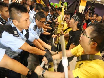 Hong Kong Police Arrest 22 Pro-Democracy Protesters