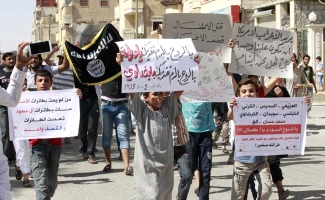 US-Led Strikes Pressure Al Qaeda's Syria Group to Join With Islamic State