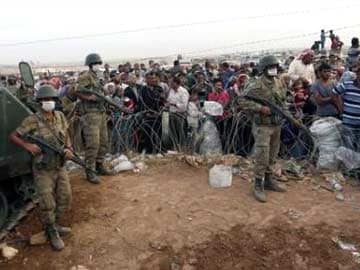 Turkey Refugee Crisis Deepens as Islamic State Besieges Syrian Border Town