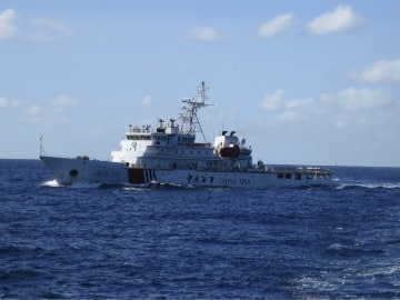 China Builds Military Airstrip on Disputed Island: Report