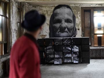 Street Artist Revisits Ghosts of Ellis Island Hospital