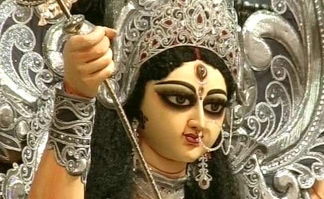 Durga Puja Revellers Line up to See Diamond-Studded Idols