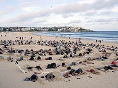 G20 Climate Protesters Bury Heads in Bondi Sands in Australia