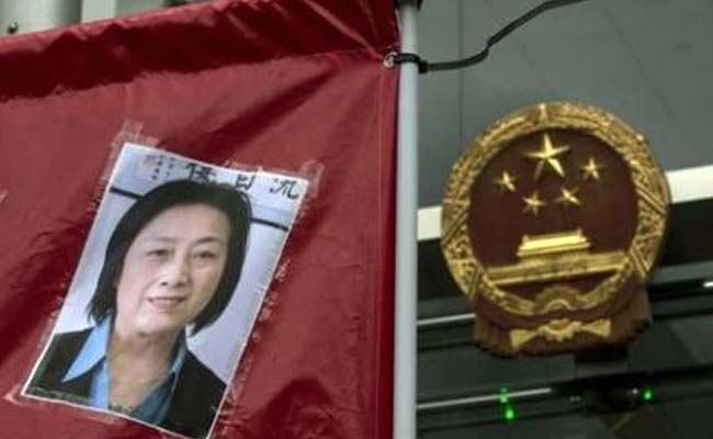 China Courts Put Reporter on Trial, Reject Uighur Scholar's Appeal