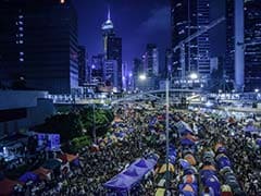 Hong Kong Democracy Protesters March to China Office